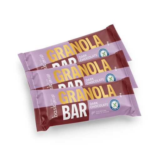 Three packages of Baskin-Robbins Dark Chocolate Granola Bars on a white background