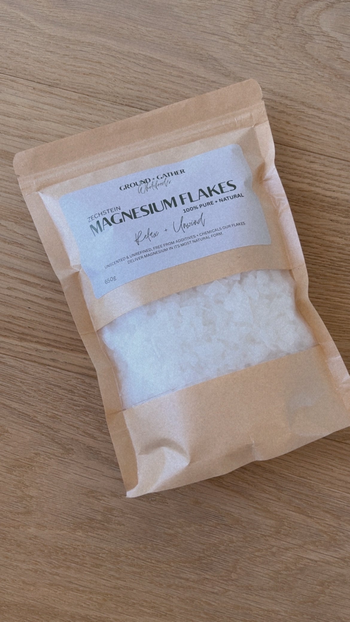 Package of magnesium flakes on a wooden surface