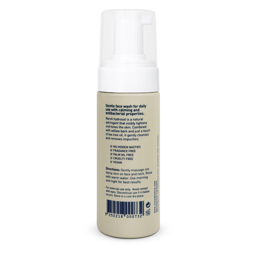 Skincare bottle with text and barcode on a white background